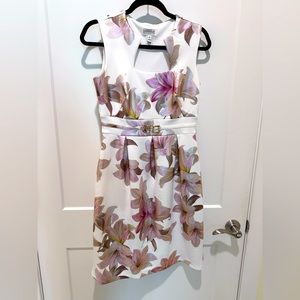 Stunning white floral dress with pink, gold, and silver elements
